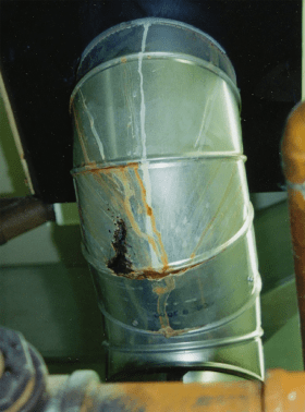 Image of corroded steel vent connector pipe