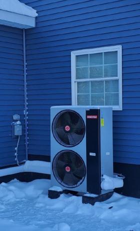 Outside view of split-system air-to-water heat pump