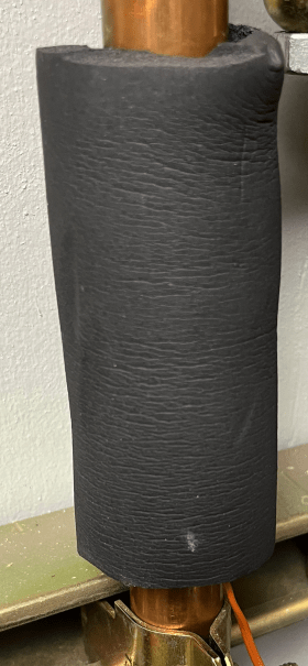 Image of thermocouple wrapped with elastomeric foam insulation